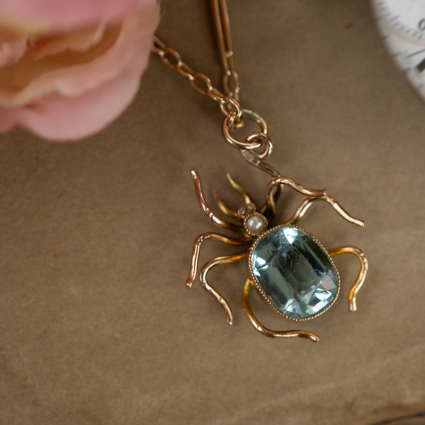 VICTORIAN LARGE 9CT GOLD PASTE AND PEARL SPIDER PENDANT