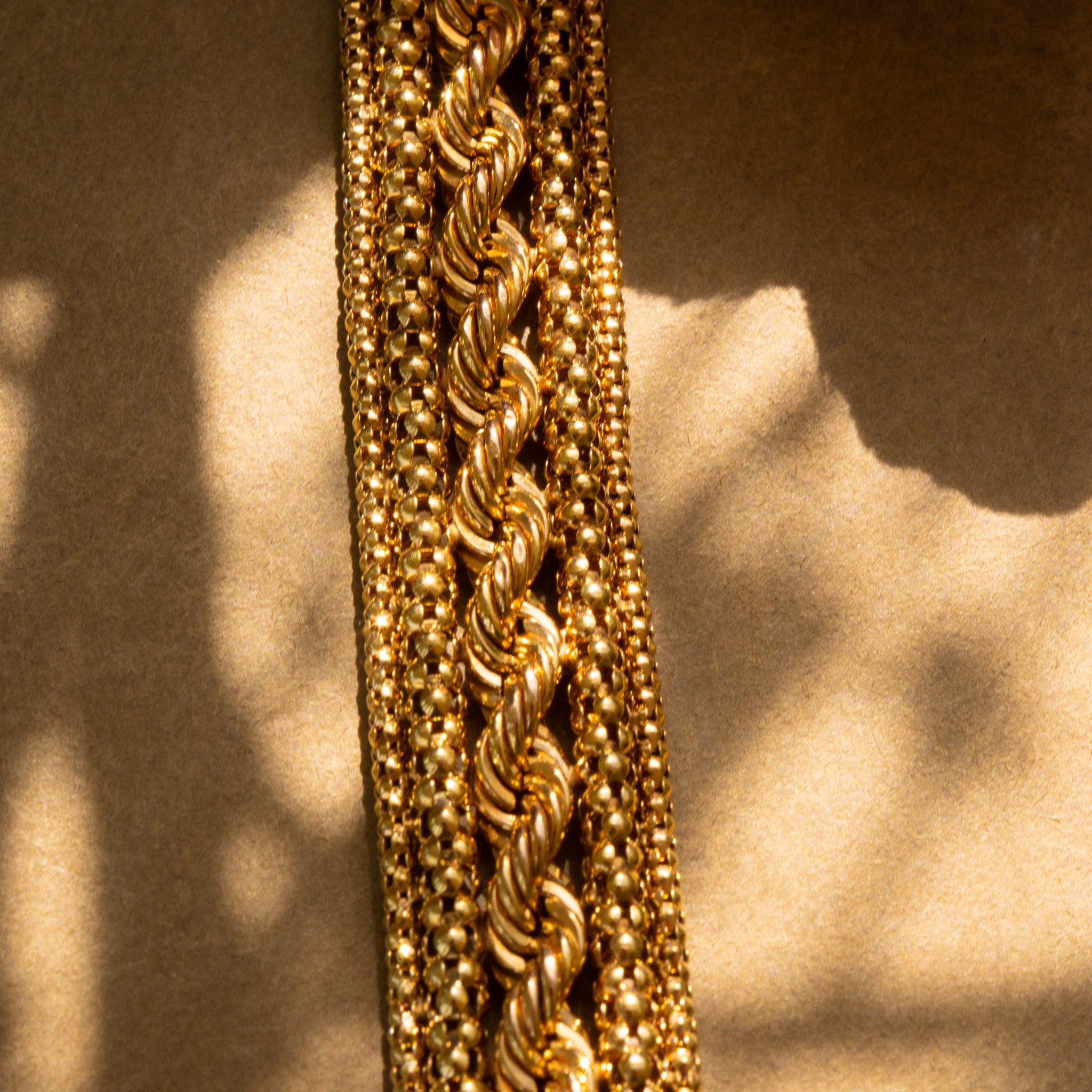 UNOAERRE 9CT GOLD WOVEN BRACELET - ITALIAN GOLD