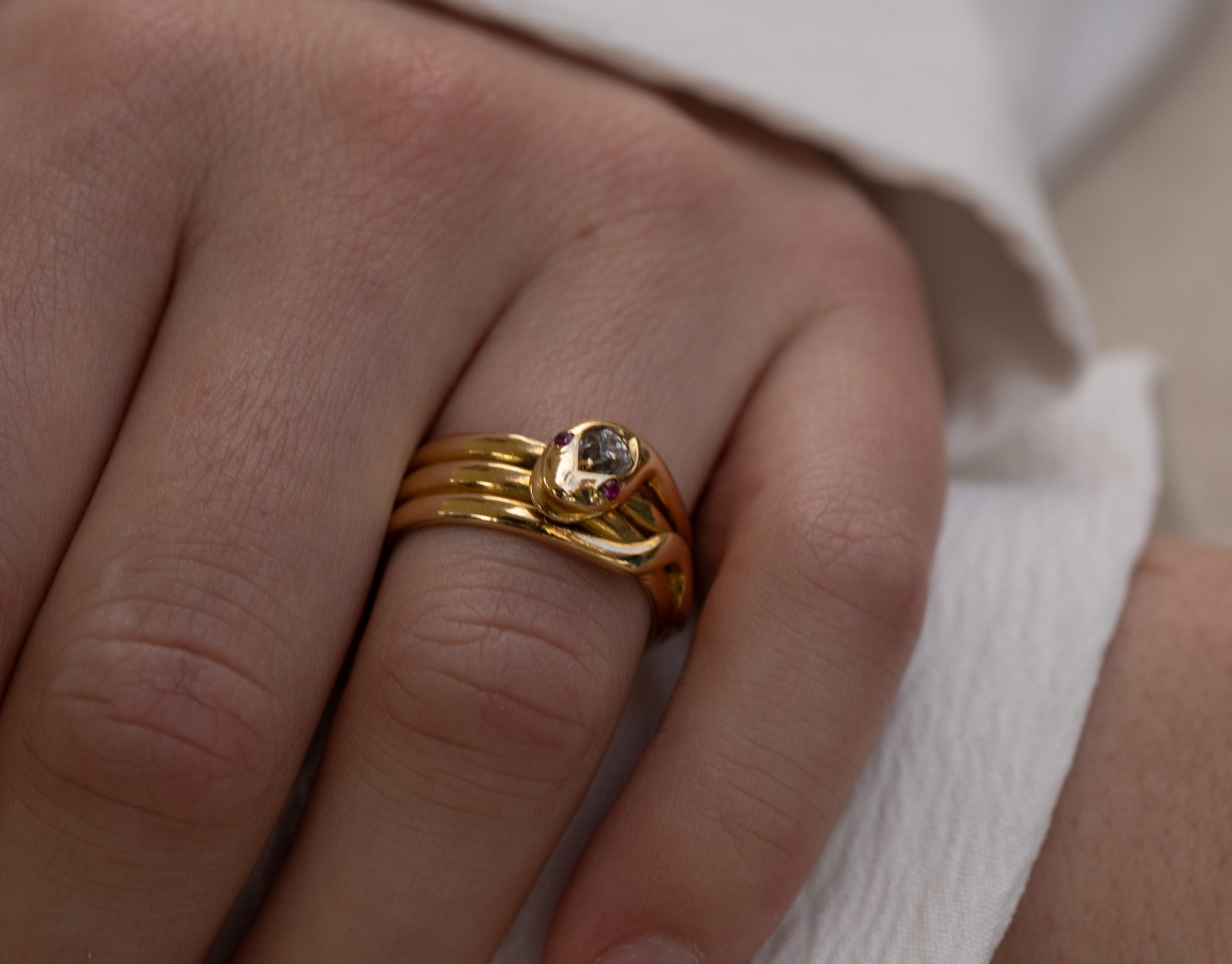 VICTORIAN 18CT SNAKE RING SET WITH OLD CUT DIAMOND AND RUBY EYES