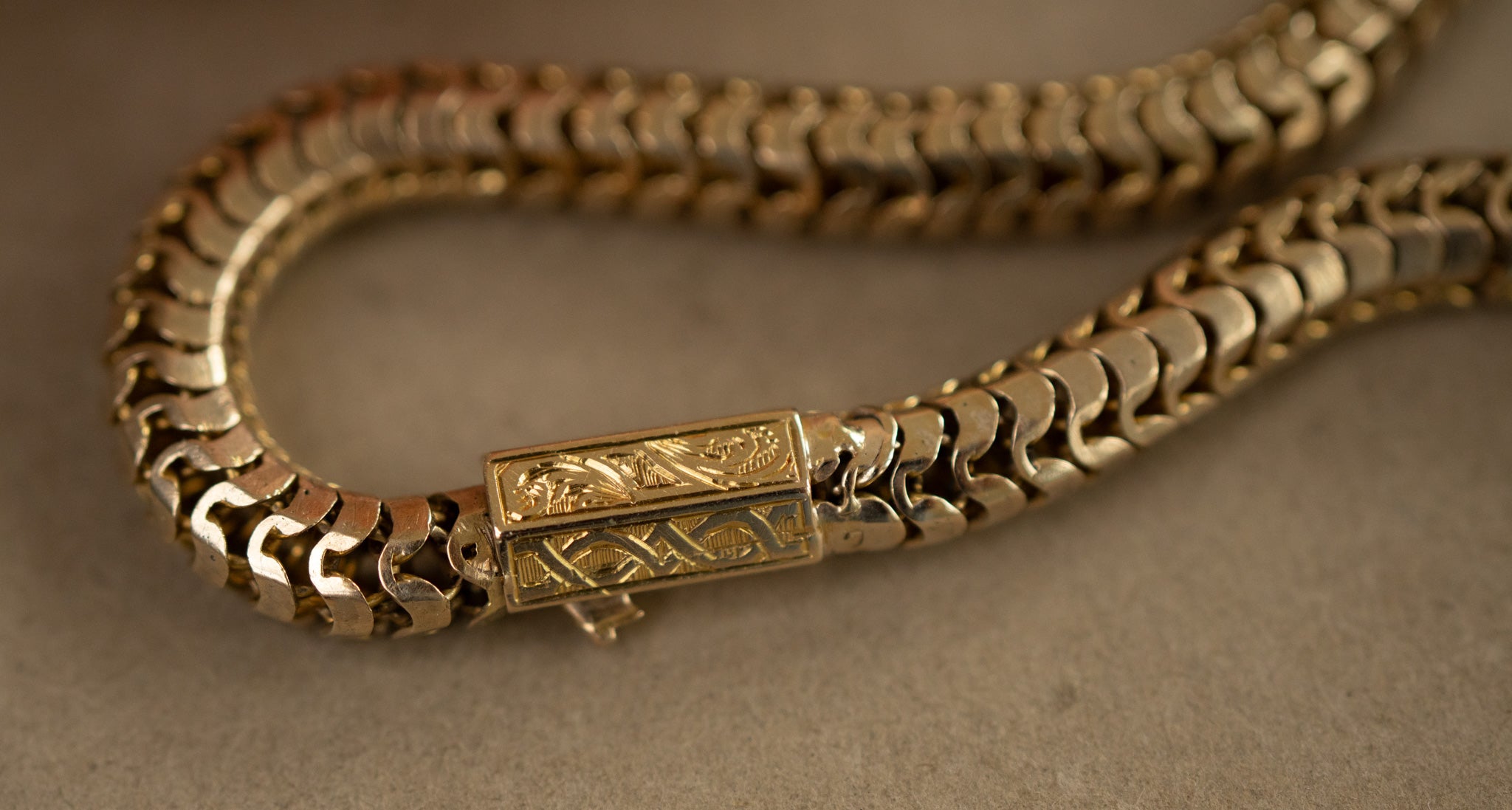 9CT GOLD SNAKE BRACELET WITH FANCY BOX CLASP