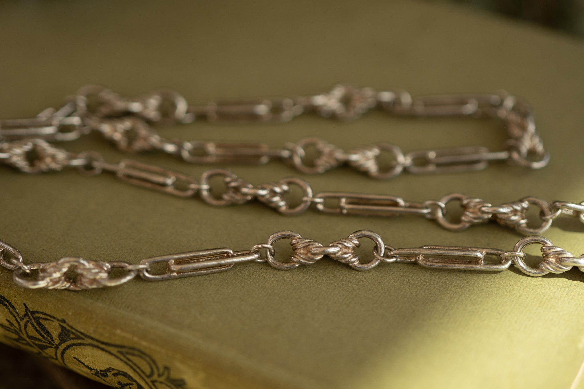 VINTAGE STERLING SILVER DOUBLE TROMBONE AND LOVERS KNOT RESERVED