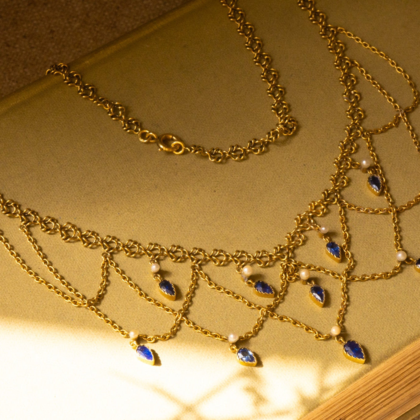 French Belle Époque festoon swag necklace in 18ct gold with Sapphires and Pearls